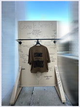 Load image into Gallery viewer, THEY NEED US LATTE T-SHIRT
