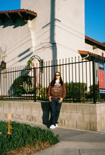 Load image into Gallery viewer, THEY NEED US BROWN ZIP UP SWEATSHIRT
