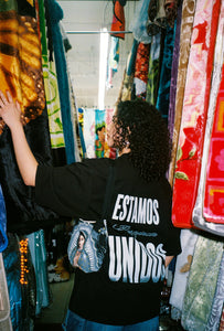 THEY NEED US BLACK T-SHIRT
