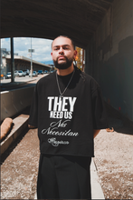 Load image into Gallery viewer, THEY NEED US BLACK T-SHIRT
